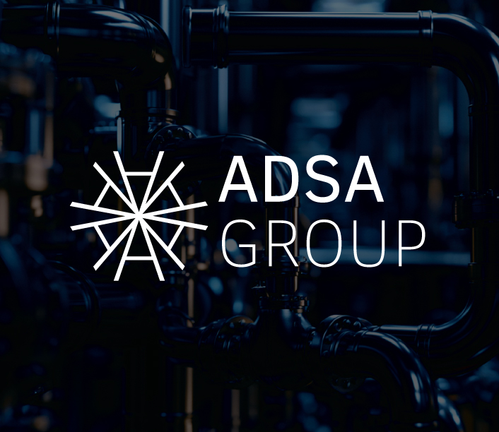 ADSA Group logo over a dark industrial pipework background