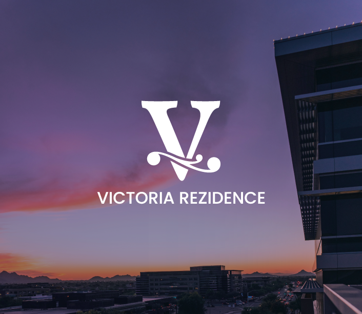 Victoria Residence logo over a sunset skyline